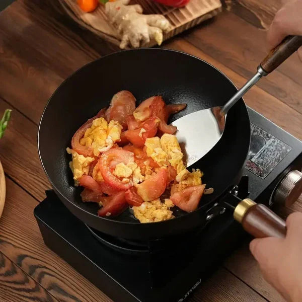 Handcrafted Iron Skillet with Wooden Handle – 24–28 cm