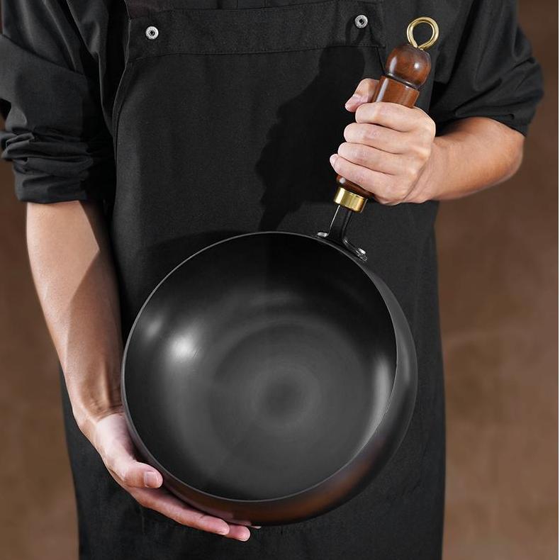Handcrafted Iron Skillet with Wooden Handle – 24–28 cm