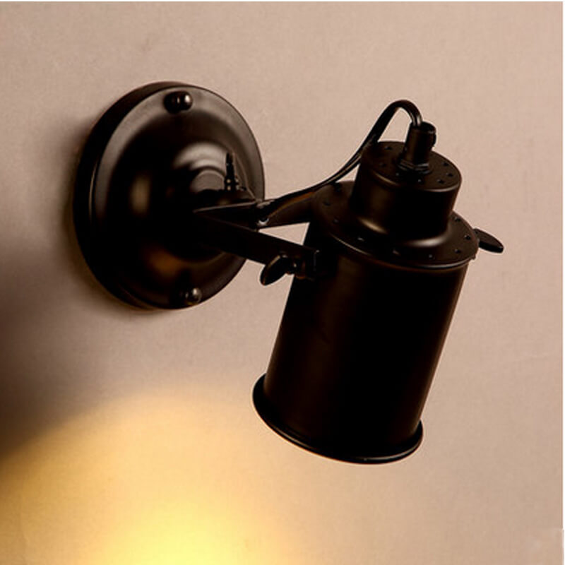 Versatile Wrought Iron Wall Light with Adjustable Arm