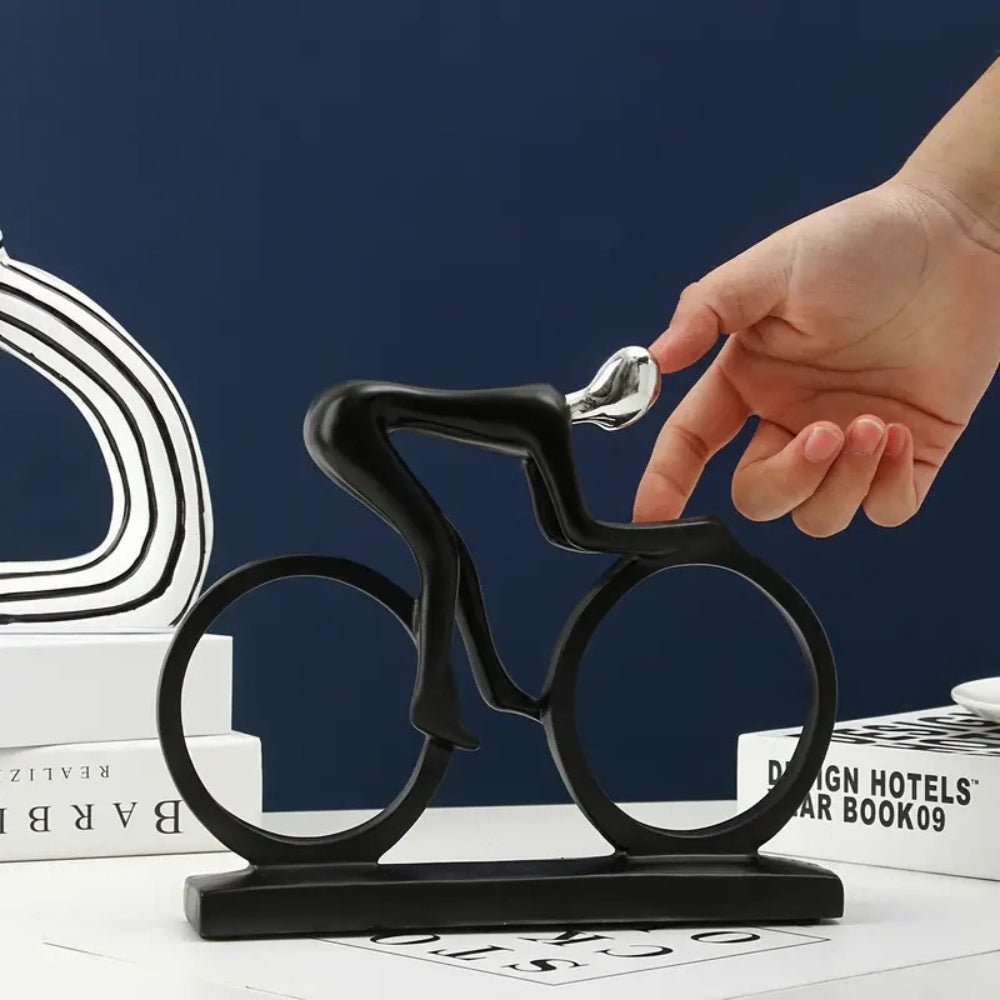 Elegant Cyclist Figurine with Chic Black and Gold Design