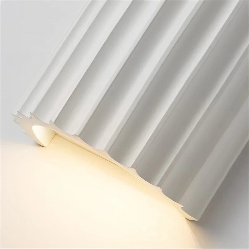 Elegant Ribbed Wall Sconce for Cozy Ambient Illumination