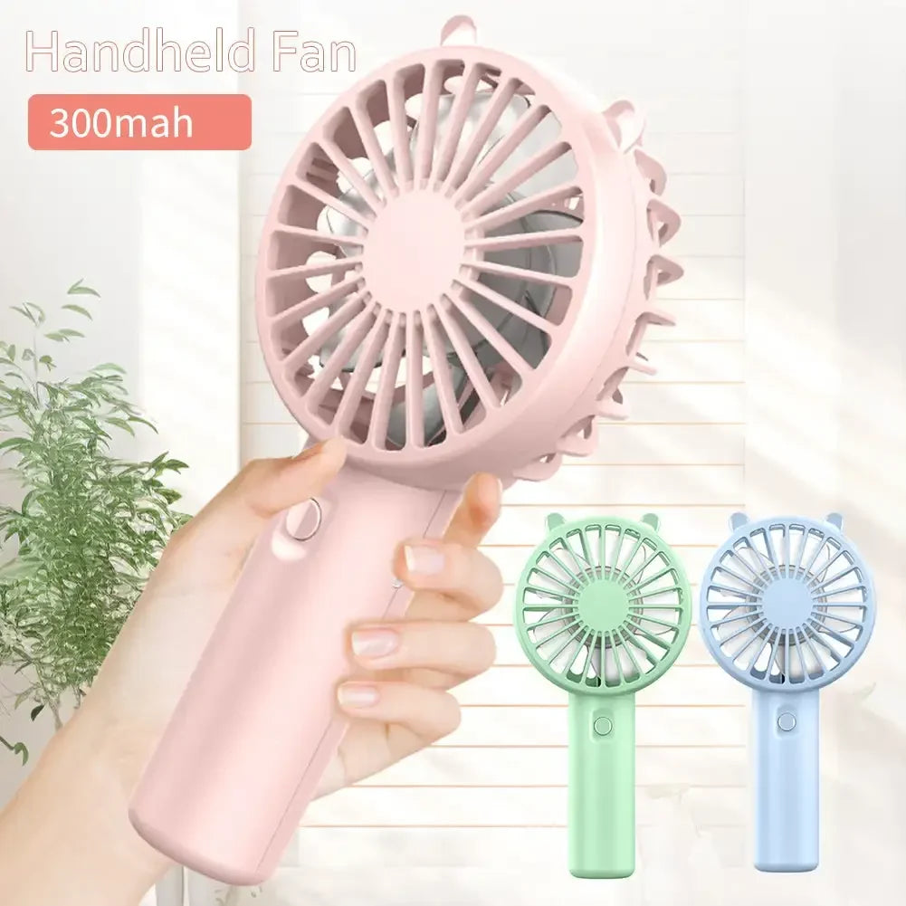 Mini Handheld Fan – USB Rechargeable Portable Device (Buy 1 Get 1 Free)