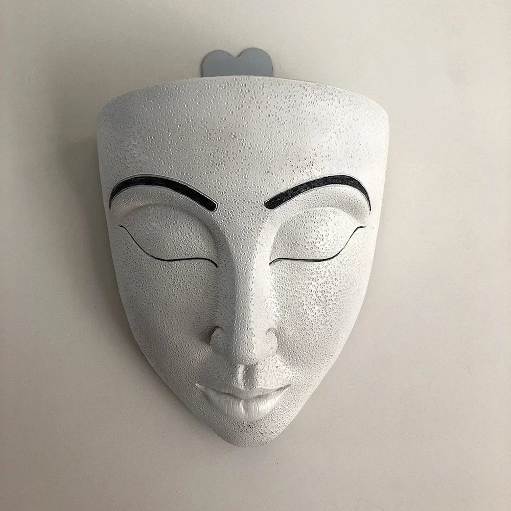 Ornamental Planter Featuring Fierce Human Face Design