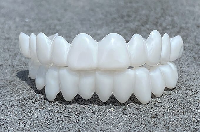 Smile Bright Dental Covers for a Confident Smile