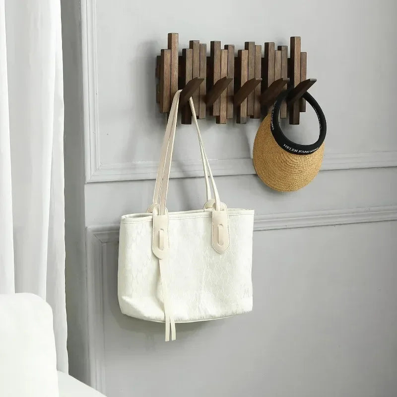 Elegant Wall-Mounted Wooden Coat Rack with Flip-Down Hooks