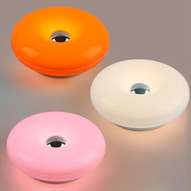 Luminous Delight – Stylish Orange Doughnut-Shaped Lamp