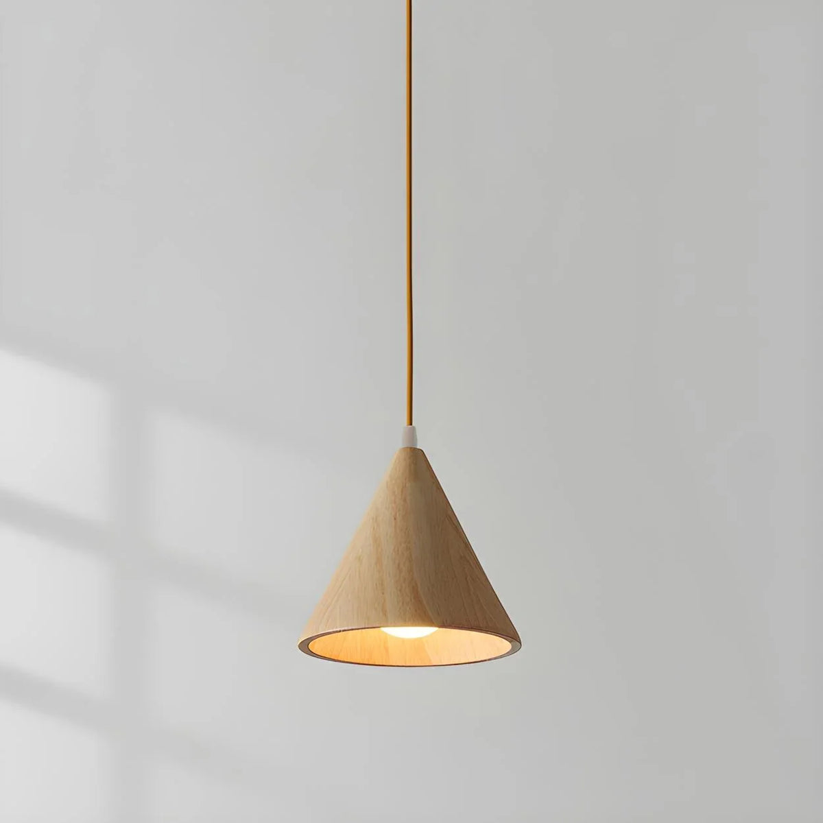 Triad Wood Cone Pendant Light for Modern Spaces