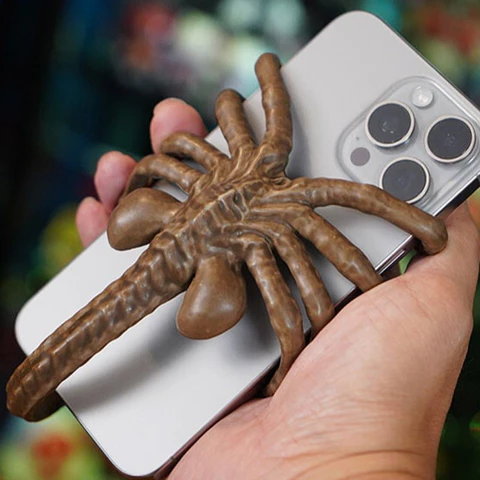 Quirky Alien Embrace Phone Stand
