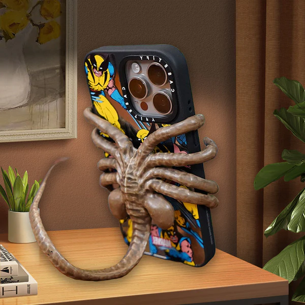 Quirky Alien Embrace Phone Stand