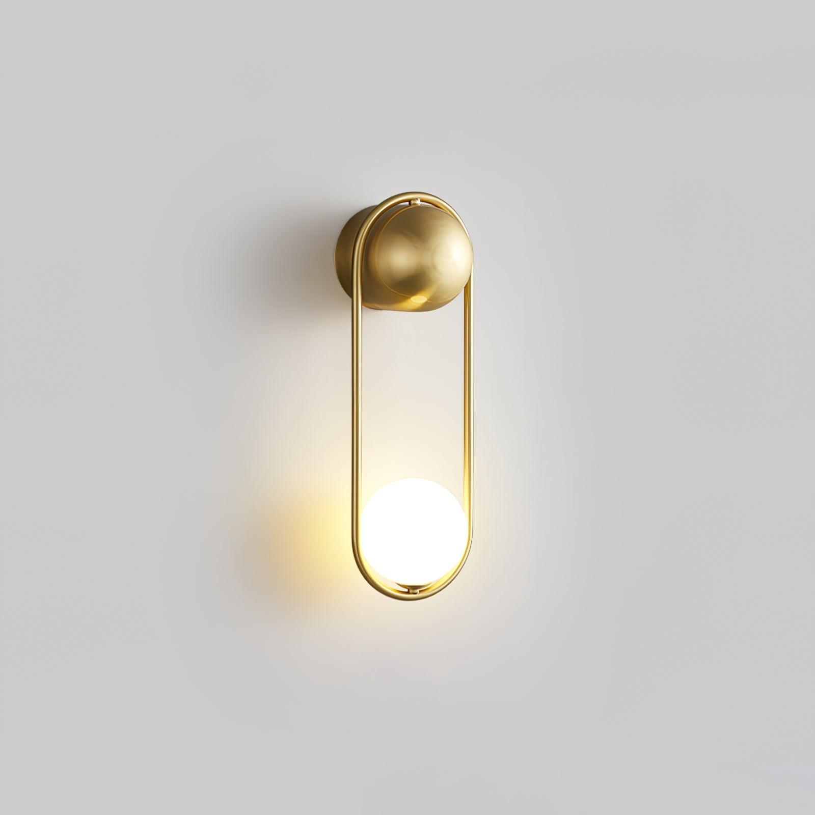 Elegant Brass Wall Light with Glass Shade for Indoor Spaces