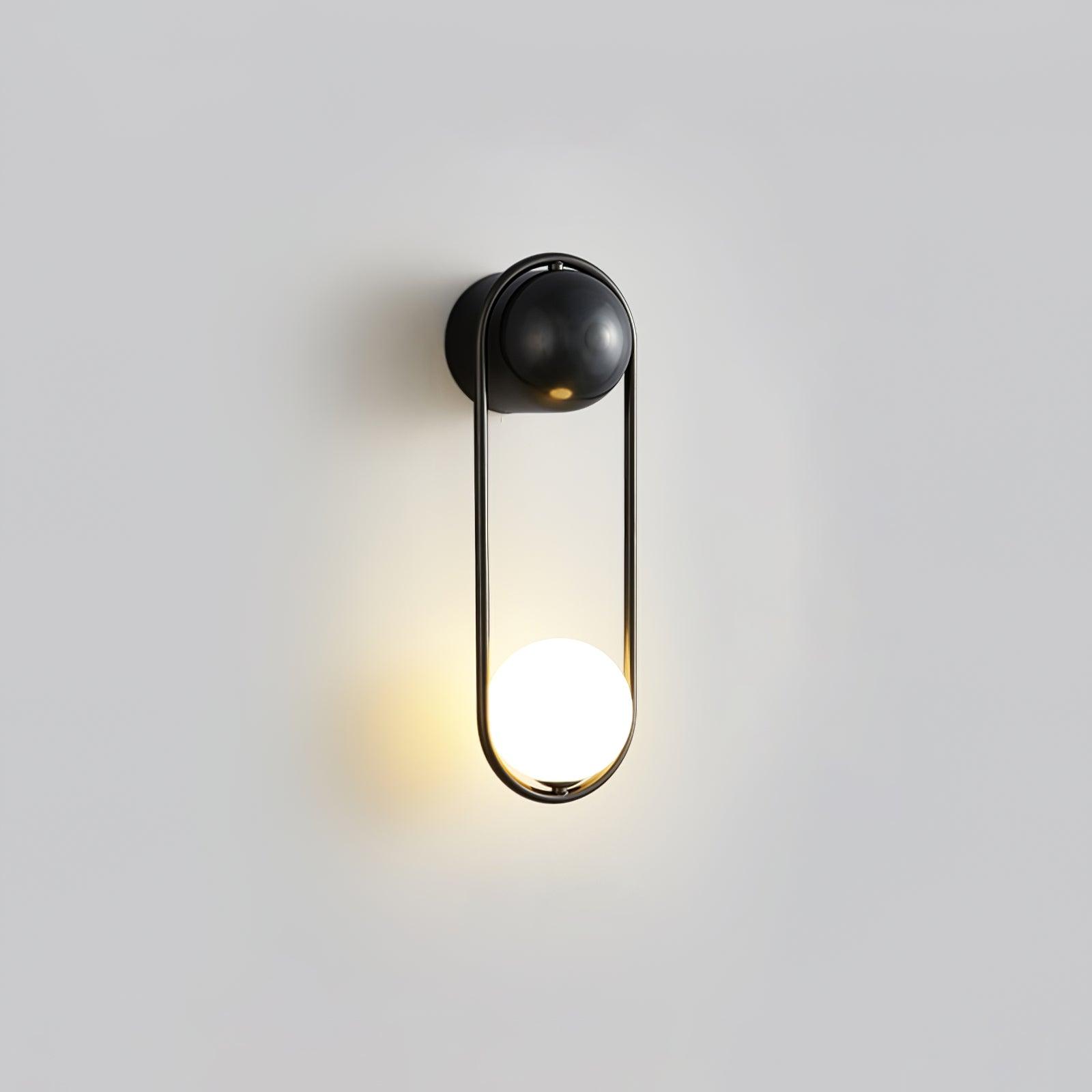 Elegant Brass Wall Light with Glass Shade for Indoor Spaces