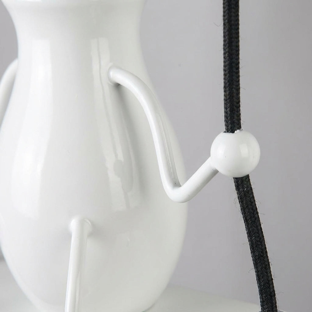 Whimsical Wall Light with Swinging Design