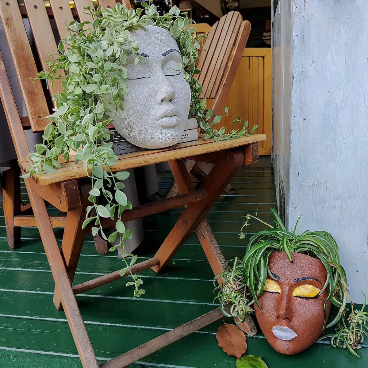 Ornamental Planter Featuring Fierce Human Face Design
