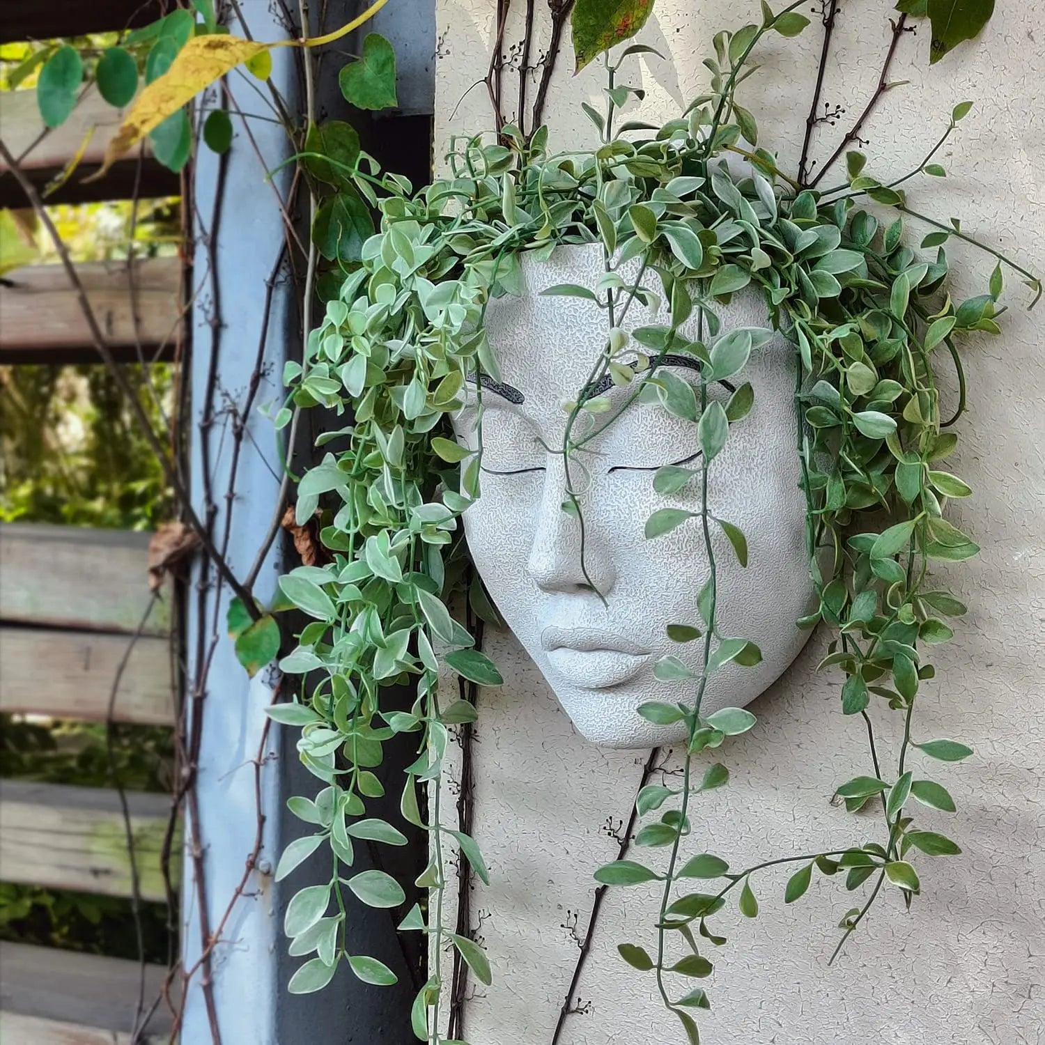 Ornamental Planter Featuring Fierce Human Face Design