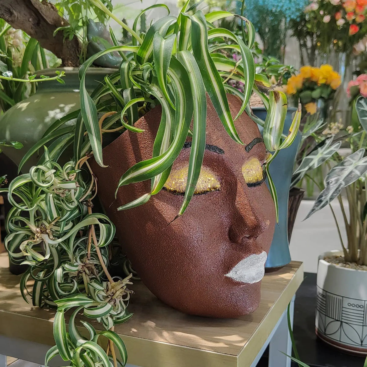 Ornamental Planter Featuring Fierce Human Face Design