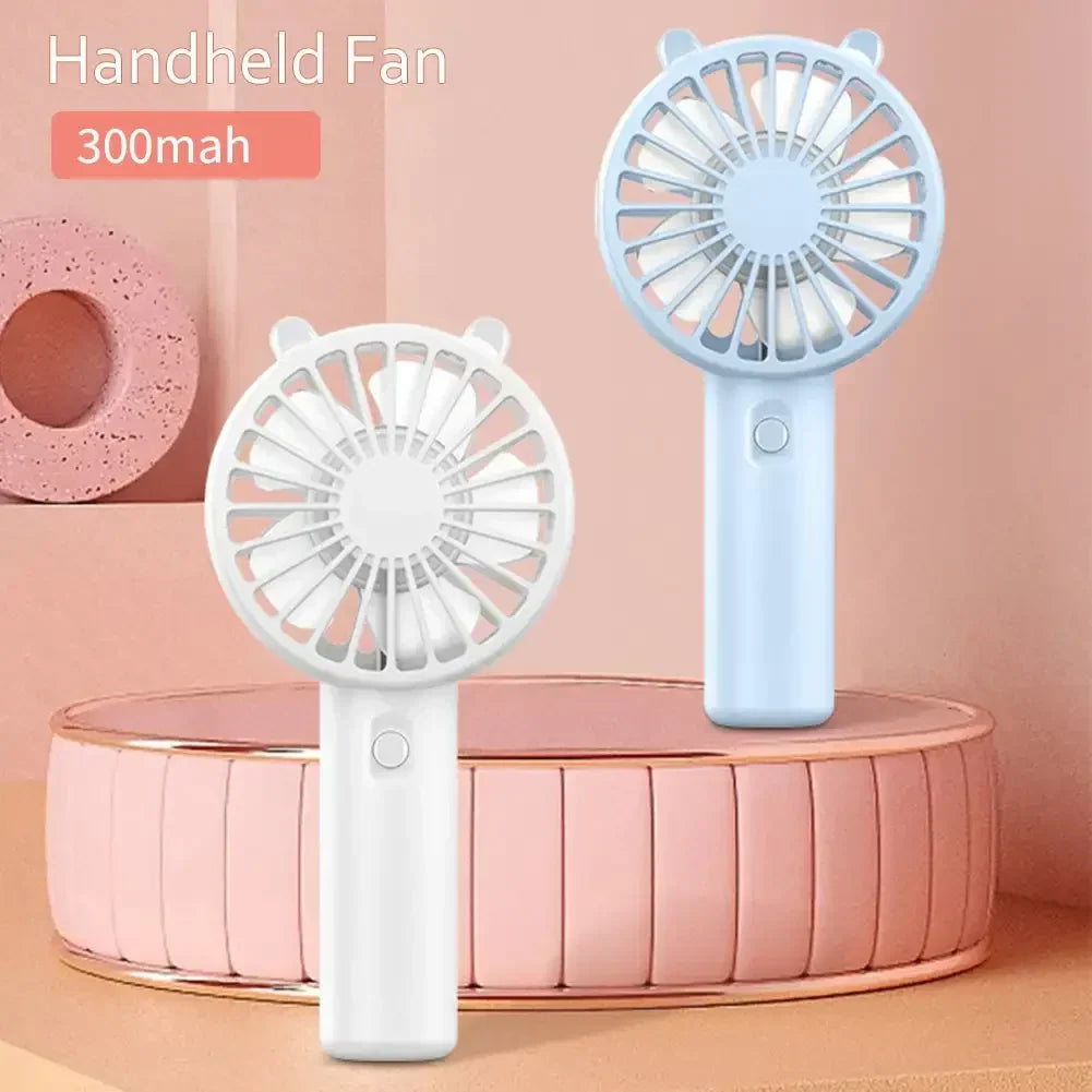 Mini Handheld Fan – USB Rechargeable Portable Device (Buy 1 Get 1 Free)