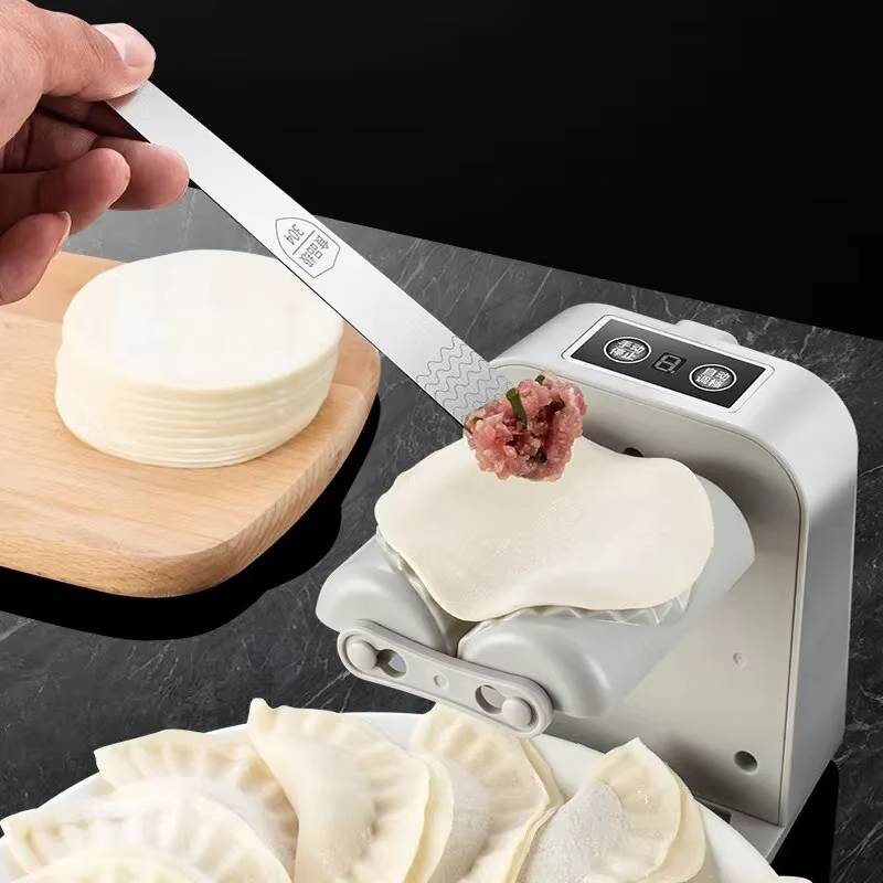 Effortless Dumpling Creator with Automated Folding