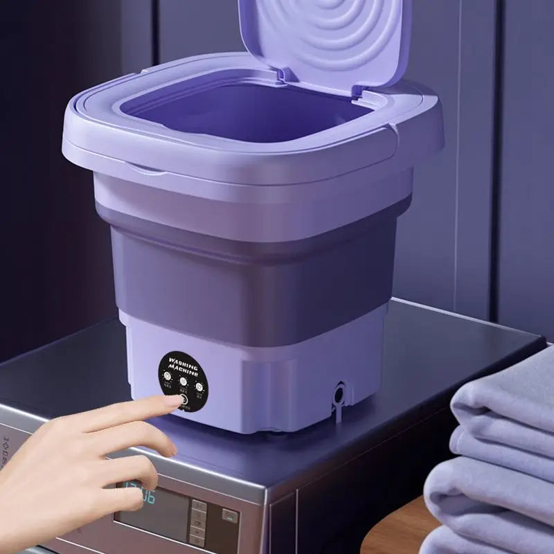 Compact Folding Laundry Solution with Integrated Spin Dryer