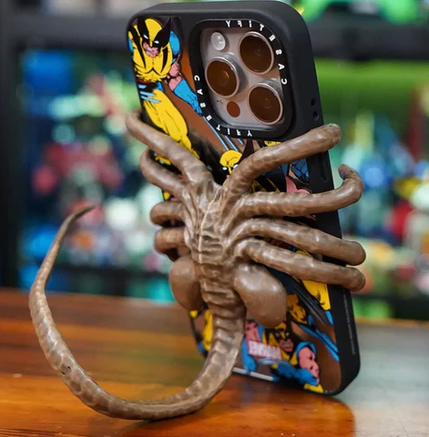 Quirky Alien Embrace Phone Stand