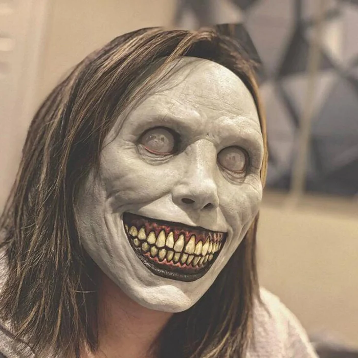 Chilling Grinning Demon Mask - Eerie White-Eyed Horror Face